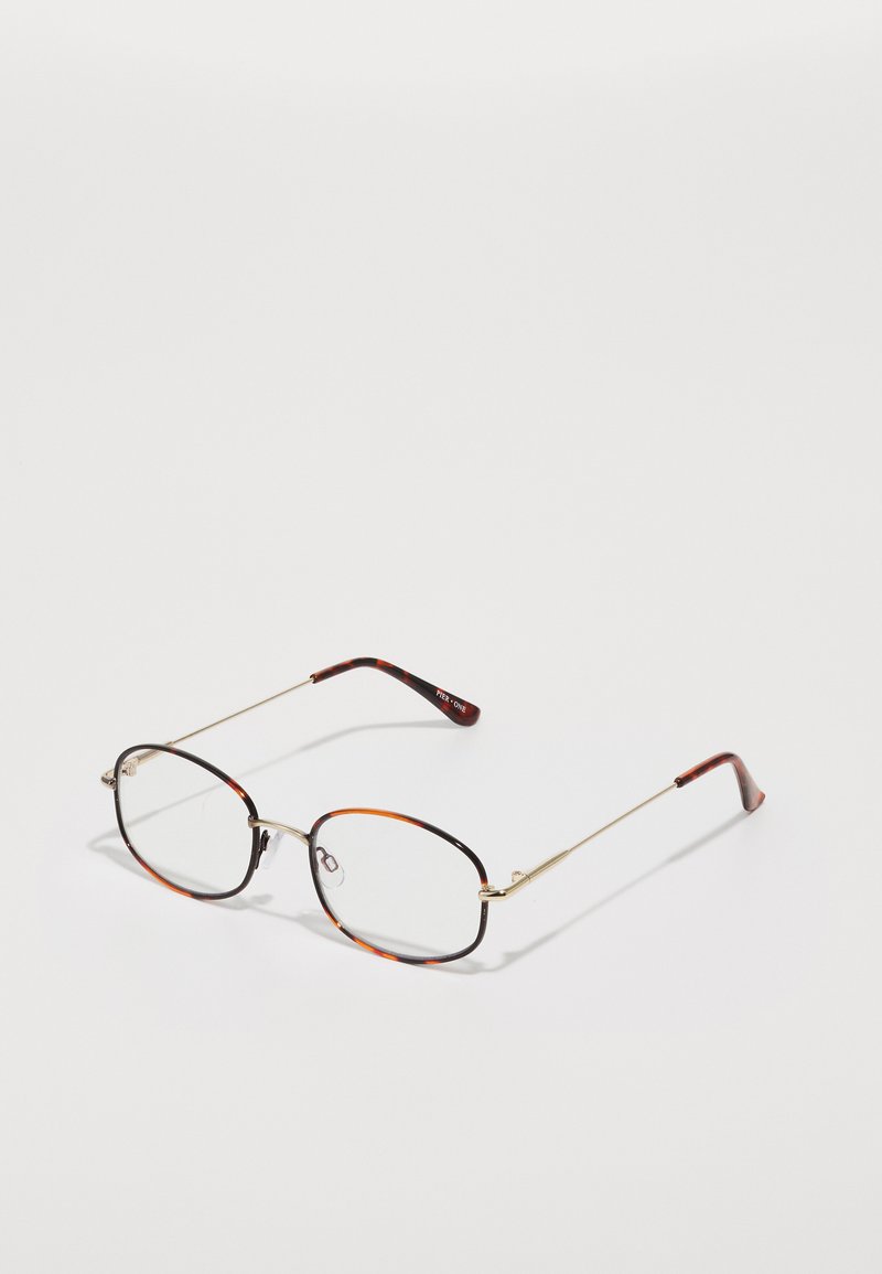 Ochelari din metal cu lentile ovale, cadru din tartan, accente aurii și brațe subțiri cu o curbă subtilă și vârfuri modelate.