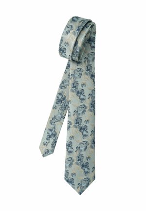 Light blue necktie with dark blue and beige floral pattern, loosely rolled at one end on a white background.