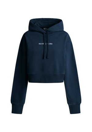 Granatowa krótka bluza z kapturem o długich rękawach, z regulowanym sznurkiem w kapturze, ściągaczami na mankietach i u dołu, z napisem „RED BULL RACING” na środku przodu.