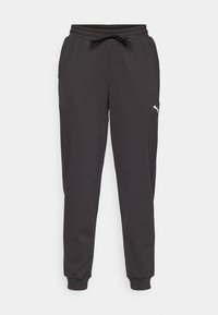 Black jogger pants made of soft material, featuring an elastic waistband with a drawstring and ribbed cuffs. White logo detail on side.
