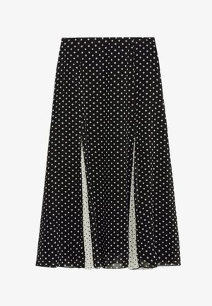 Zwarte rok met witte stippen, met een luchtig ontwerp en zijsplitten, gemaakt van lichtgewicht stof en met een gladde textuur.