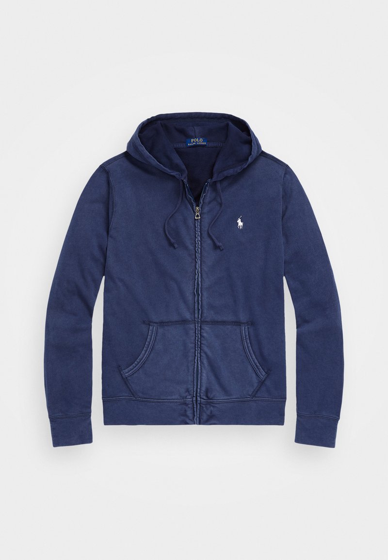 Un sweat à capuche zippé bleu marine en coton doux, avec une poche avant, des cordons de serrage ajustables et un petit logo brodé sur la poitrine.