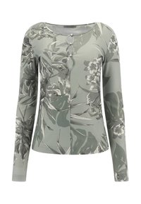 Blouse à manches longues florale en vert doux avec texture côtelée. Comprend cinq boutons décoratifs et un col rond avec imprimé floral.