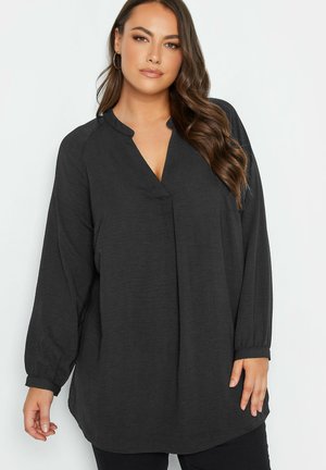 Black long-sleeve blouse with a notched collar, loose fit, and gathered cuffs. Made from textured fabric with a smooth finish.