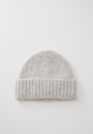 Gray knit beanie made from fuzzy wool, featuring a ribbed cuff and rounded top, with a soft texture and uniform color throughout.