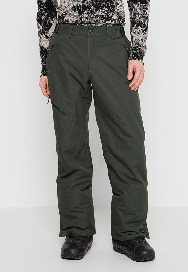 Grüne wasserdichte Skihosen mit geradem Schnitt, seitlichen Reißverschlüssen und verstärkten Knien für verbesserte Haltbarkeit und Beweglichkeit.