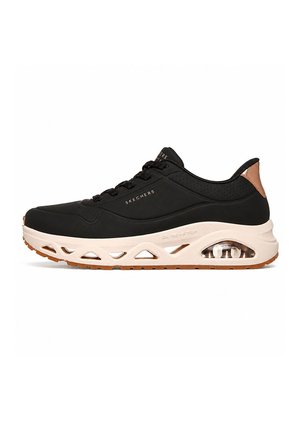 Czarne buty sportowe Skechers z białą wyściełaną podeszwą, widoczną poduszką powietrzną, sznurowaniem z przodu i brązowym akcentem na pięcie.