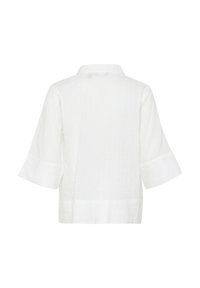Camicia bianca con colletto e maniche a tre quarti, caratterizzata da un leggero motivo testurizzato. La vista dal retro mostra una vestibilità rilassata e un orlo dritto.