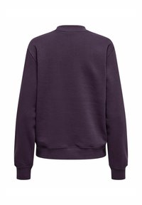 Lilla crewneck sweatshirt lavet af blødt stof, med lange ærmer og ribbet kant. Bagsiden er ensfarvet uden synlige logoer eller designs.