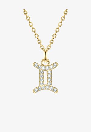 Arany nyaklánc Ikrek szimbólummal díszített medállal, tiszta drágakövekkel ékesítve. A medál merész, modern dizájnnal rendelkezik, fényes felülettel.