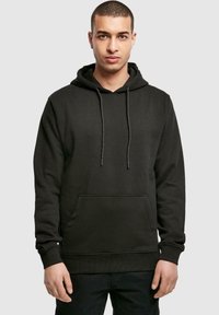 Black hooded sweatshirt with a kangaroo pocket, drawstring, ribbed cuffs, and hem. Made from a soft material, featuring a smooth texture.