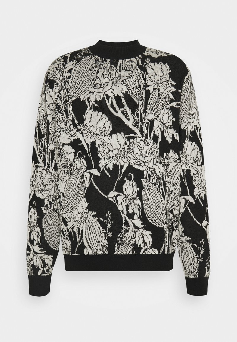 Pull noir à col ras du cou avec un motif floral et feuillage blanc, poignets et ourlet côtelés, et un col ajusté.