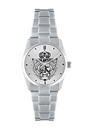 Stainless steel watch with a round case and a silver textured dial featuring a black crown and skull design, silver hands, and a link bracelet.