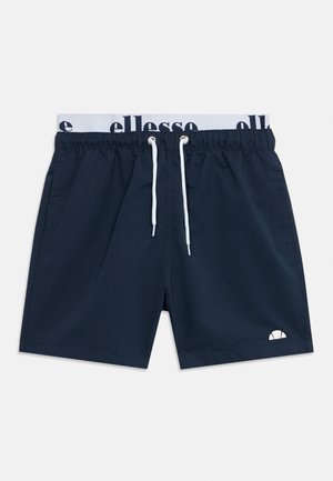 Granatowe szorty z elastycznym pasem, białymi sznurkami i widocznym białym, oznakowanym pasem, wyposażone w boczne kieszenie oraz małe logo na lewej nodze.