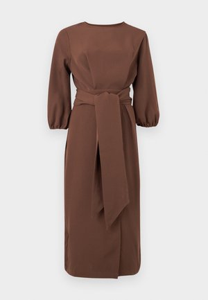 Brown midi dress with three-quarter puff sleeves and a wide fabric belt tied at the waist, featuring a modest round neckline and straight skirt.