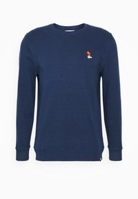 Navy blue sweatshirt made of soft cotton. Features a round neck, long sleeves, and small floral embroidery on the chest.