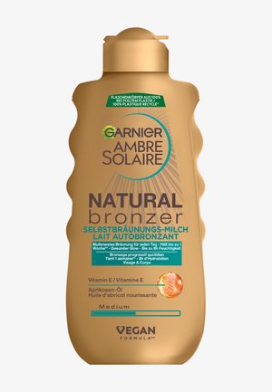 Garnier AMBRE SOLAIRE NATURAL BRONZER SELF-TANNING LOTION - Huiles et scintillants pour le corps
