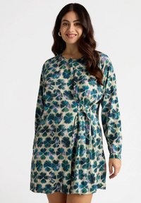 Langärmliges Kleid aus weichem Stoff mit floralem Muster in Grünt�önen, Blau und Lila. Mit einem Knoten-Detail an der Taille.