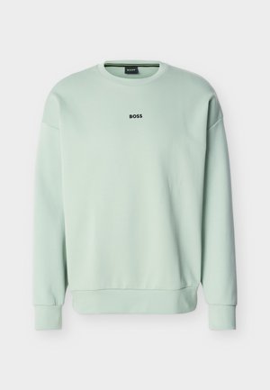 Μακριά μπλούζα crewneck σε ανοιχτό πράσινο χρώμα με το λογότυπο «BOSS» στο κέντρο του στήθους.