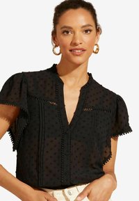 Love & Roses DOBBY SPOT RUFFLE V NECK FLUTTER SLEEVE REGULAR FIT - Paitapusero - black