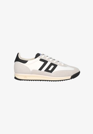 Sneakers with a white and grey suede upper. Black accents with a prominent black number '70' on the side and a textured black heel. Rubber sole.