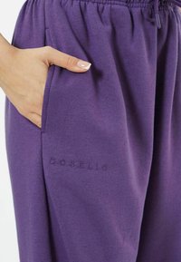 EOSELIO PASTEL - Jogginghose - grape