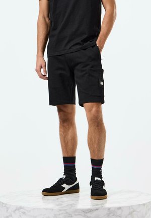 HAWKINS ZIP POCKET - Joggebukse - black
