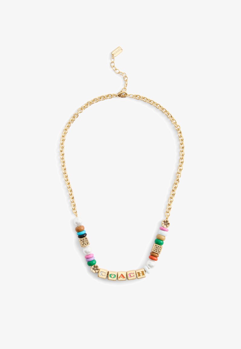 Gouden ketting met kleurrijke kralen, witte en bruine accenten, en gouden letterblokjes die "COACH" spellen. Inclusief een verstelbare sluiting.
