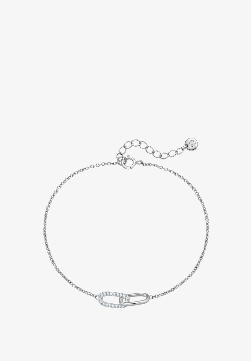 Sidabrinė grandinėlė apyrankė, kuri pasižymi dideliu popieriaus skląsčiu, puošta skaidriais kristalais. Apyrankė turi reguliuojamą užsegimą, leidžiantį keisti ilgį.