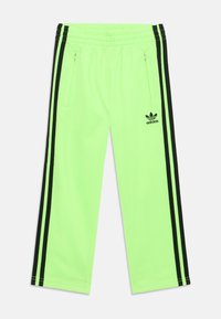 adidas Originals FIREBIRD UNISEX  - Tréningruha alsók - signal green