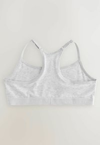 Grauer Sport-Bralette mit Racerback-Design, aus weichem Stoff gefertigt. Verfügt über einen breiten Bund mit "NEXT"-Branding entlang des unteren Saums.