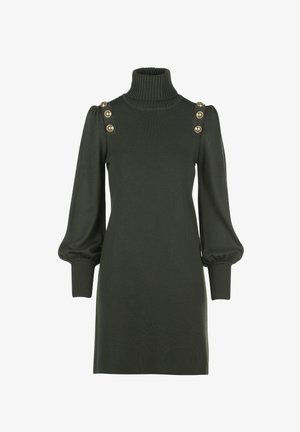 Melnā zaļa adīta kleita ar augstu turtleneck, apjomīgām pūšamām piedurknēm un zeltītām pogu akcentiem uz pleciem.