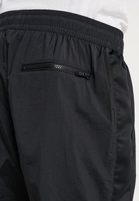 Jordan Träningsbyxor - black