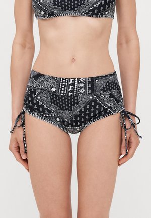 Black bikini bottom with paisley print, features side tie accents, mid-rise style, and a smooth texture. Designed for comfort and style.