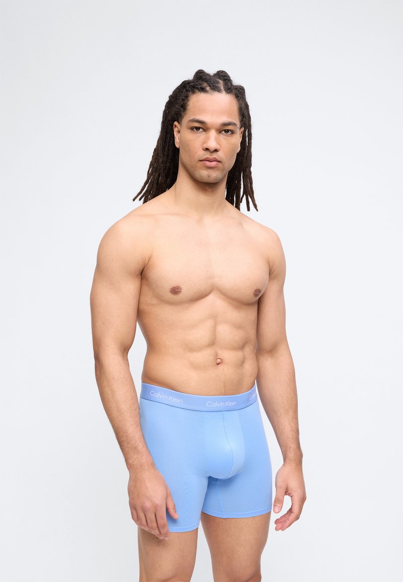 Boxer Homme Coton – Lot De 4, Stretch, Respirant – 95% Coton, 5% Élasthanne – Tailles S à XXL – Noir, Bleu, Rouge, Blanc