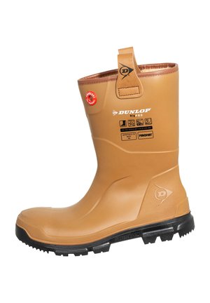 Tan Dunlop Rig PRO waterproof work boot with black sole, pull tab, and safety certification symbols on the side.