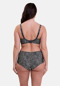 Ensemble de soutien-gorge et culotte taille haute à motif floral noir et or, avec des bretelles réglables, une large bande et un tissu doux au toucher lisse.