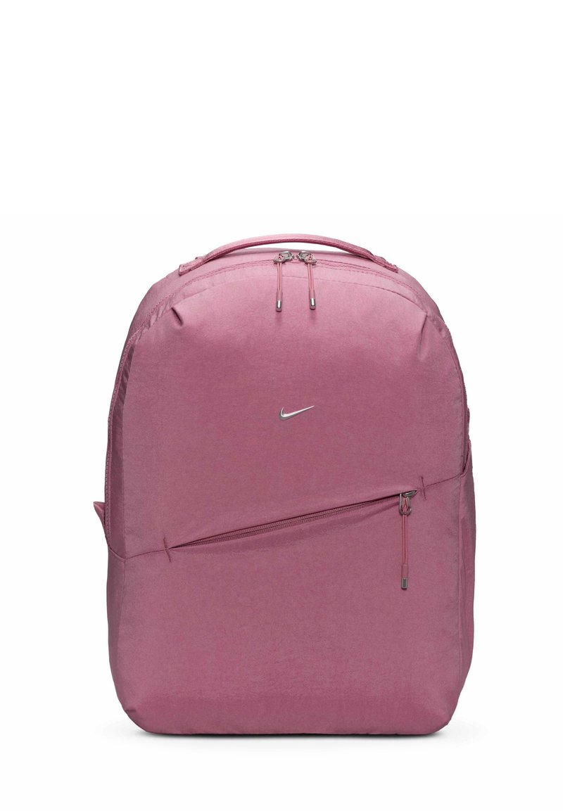 Rózsaszín hátizsák sima, matt felülettel. Fő cipzáros rekesszel, elülső cipzáros zsebbel és egy kis Nike logóval a középen.