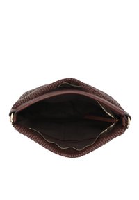 Brown woven leather handbag with a zip closure. Features a smooth interior and one small pocket, showcasing an open top view.