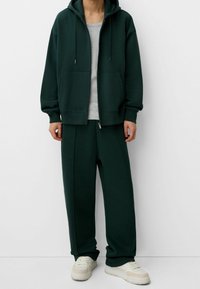 Bershka Träningsbyxor - dark green