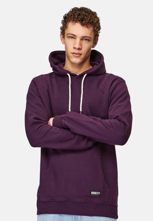 Purple hoodie made of soft fabric, featuring a front pocket, adjustable drawstring hood, and contrasting white cords. Brand label on the hem.