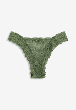 Tanga verde in pizzo con motivo floreale, caratterizzato da bordi ondulati e una fodera interna liscia. Leggero, texture morbida.
