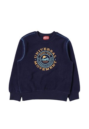 Felpa in pile navy con polsini e orlo a coste, caratterizzata da un logo ricamato multicolore che recita "UNIVERSAL MOVEMENT" sul fronte.