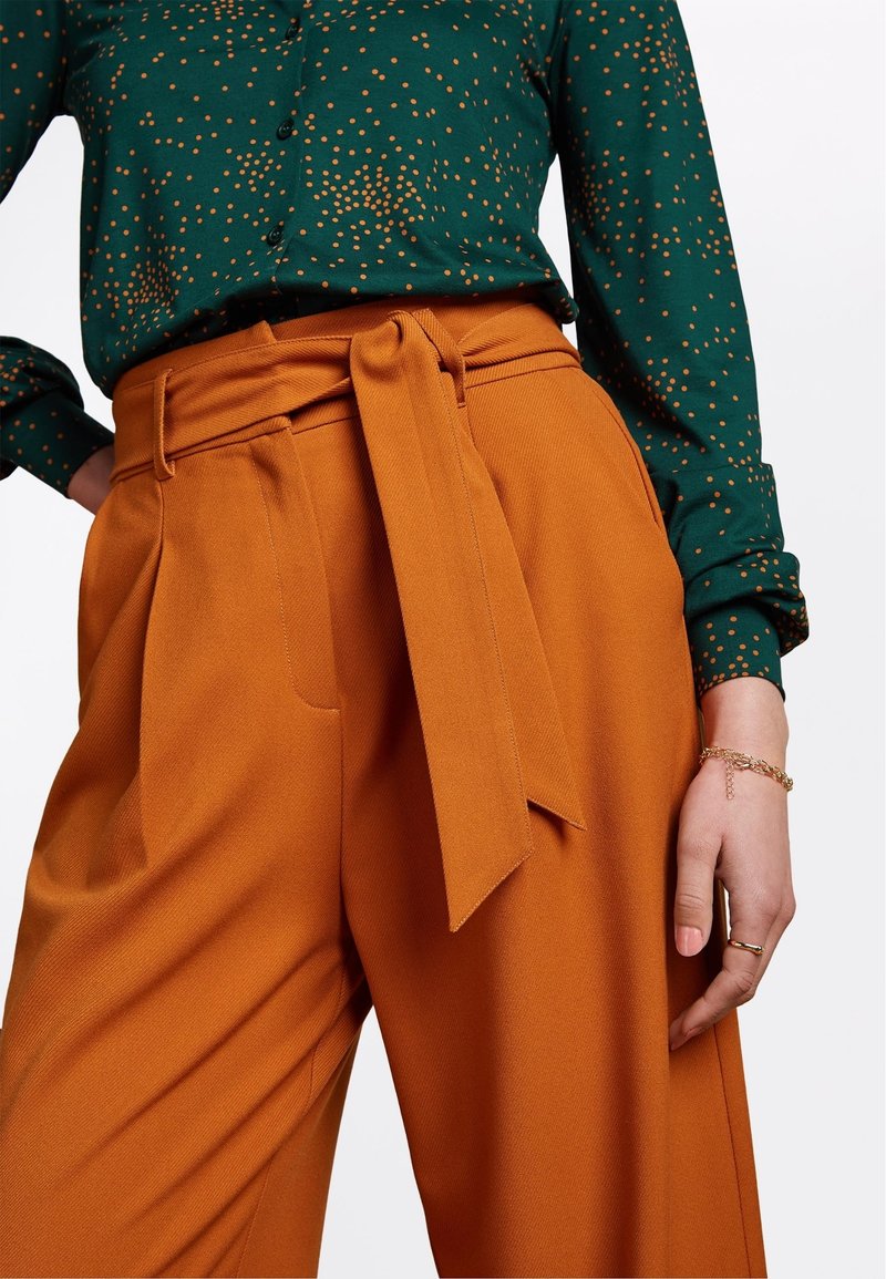 Pantalon Palazzo King Louie Rouge Et Vert Imprimé Géométrique - Taille 40-42 - Neuf Avec étiquettes
