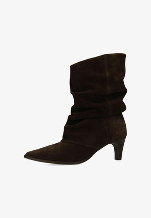 Black suede mid-calf slouchy boot with pointed toe and low, curved heel, photographed on white background.