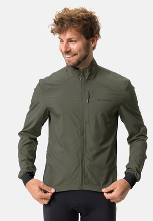 Green lightweight cycling jacket with a high collar, full front zipper, and black side panels. Features a small zippered pocket on the chest.
