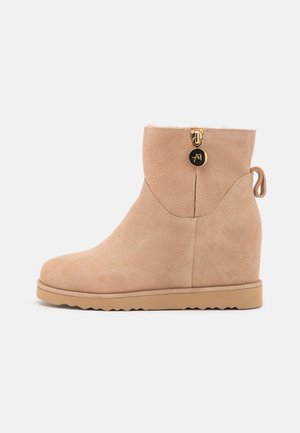 Boots à talons - beige