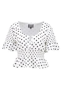 Blusa blanca con lunares negros, mangas cortas acampanadas, cintura fruncida y escote redondeado. Tejido suave con una textura ligera y aireada.