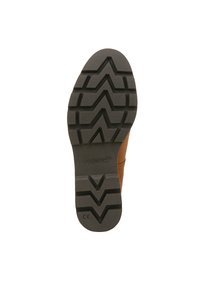 Black rubber outsole with a zigzag tread pattern and VIONIC branding; upper features a brown suede material with a textured finish.