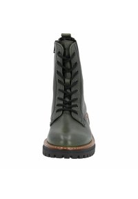 Green leather ankle boot with black laces, a rounded toe, and contrasting brown sole. Features side zip for easy wear. Flat textured surface.